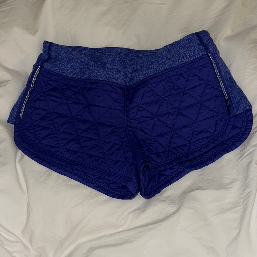 Lululemon pigment blue hot cheeks down quilt shorts. 2.5 inch inseam Size 8